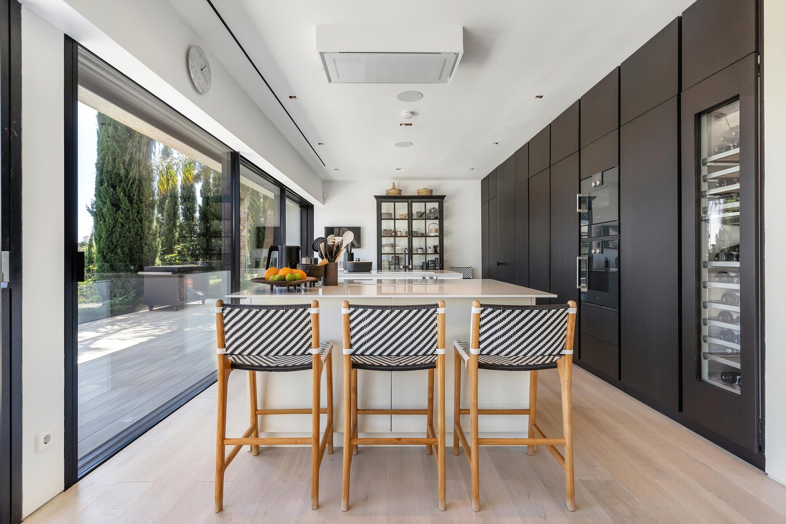 Straight-on photo of an open plan kitchen